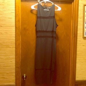 Long Black dress with mesh cutouts.